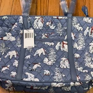 Vera Bradley small trimmed Vera with faux leather trim.